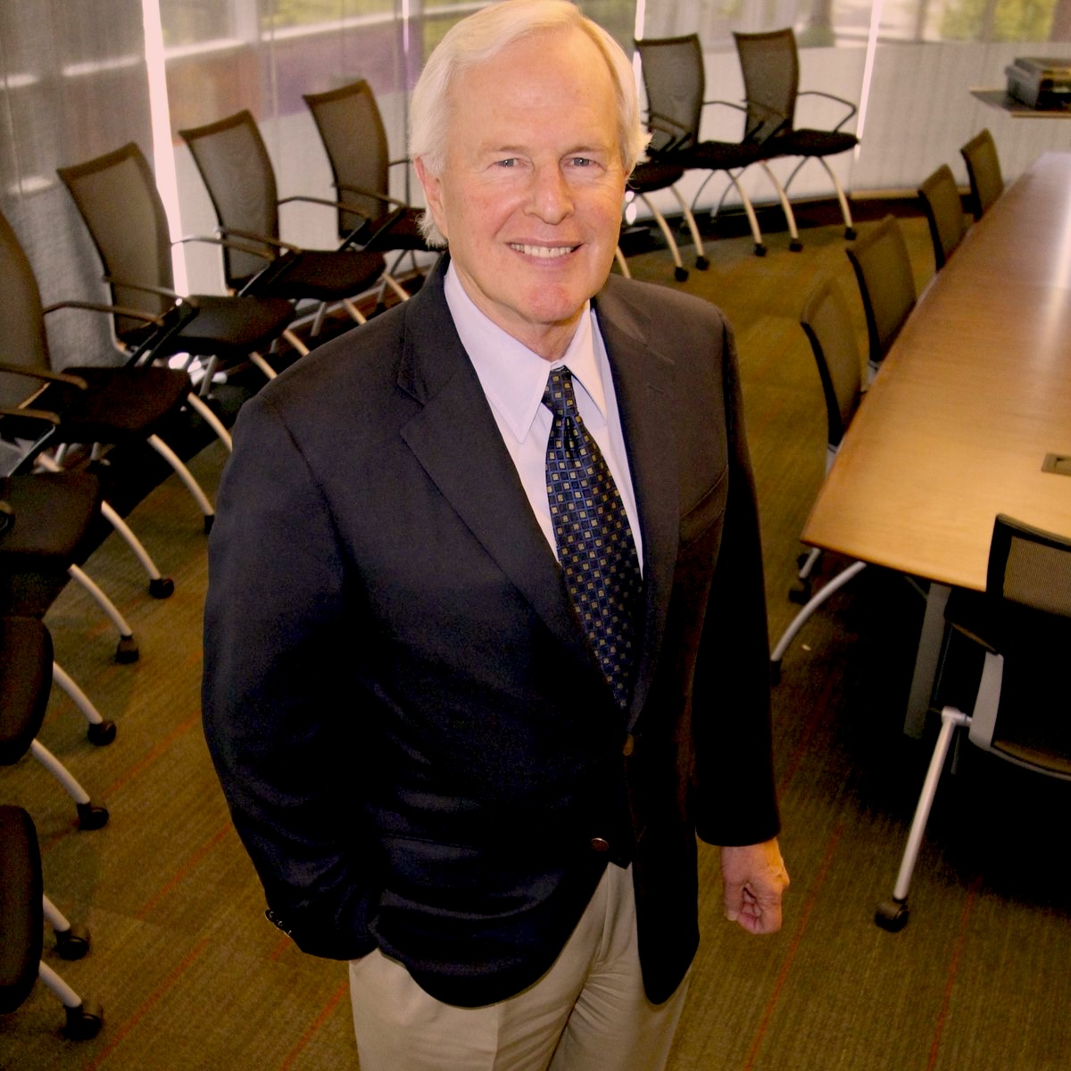 Litigation consultant preparing for a deposition, where he'll share 50 years of finance and education experience with the lawyers. Douglas Brown showing expertise in the boardroom